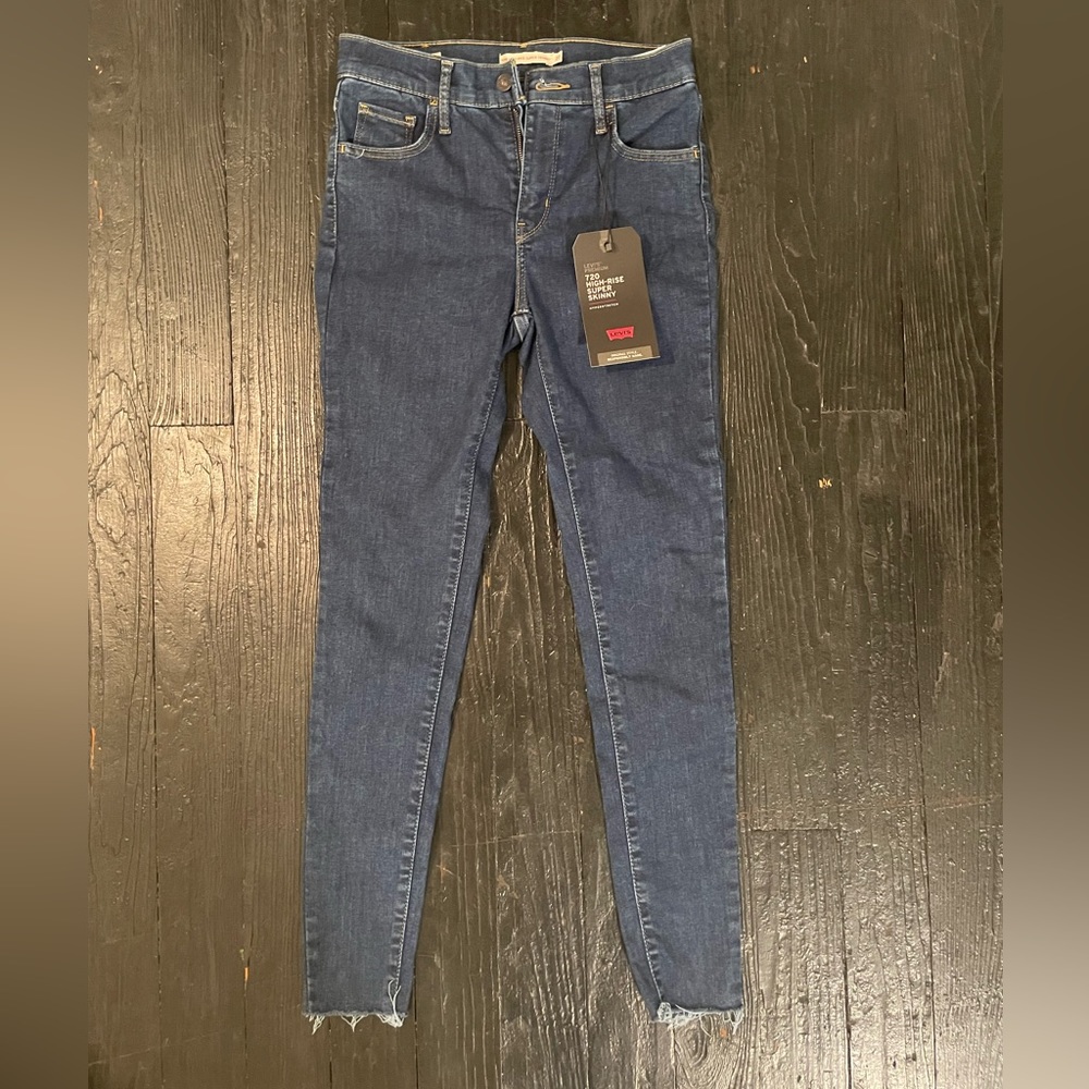 Levi dark skinny jeans with frayed bottom